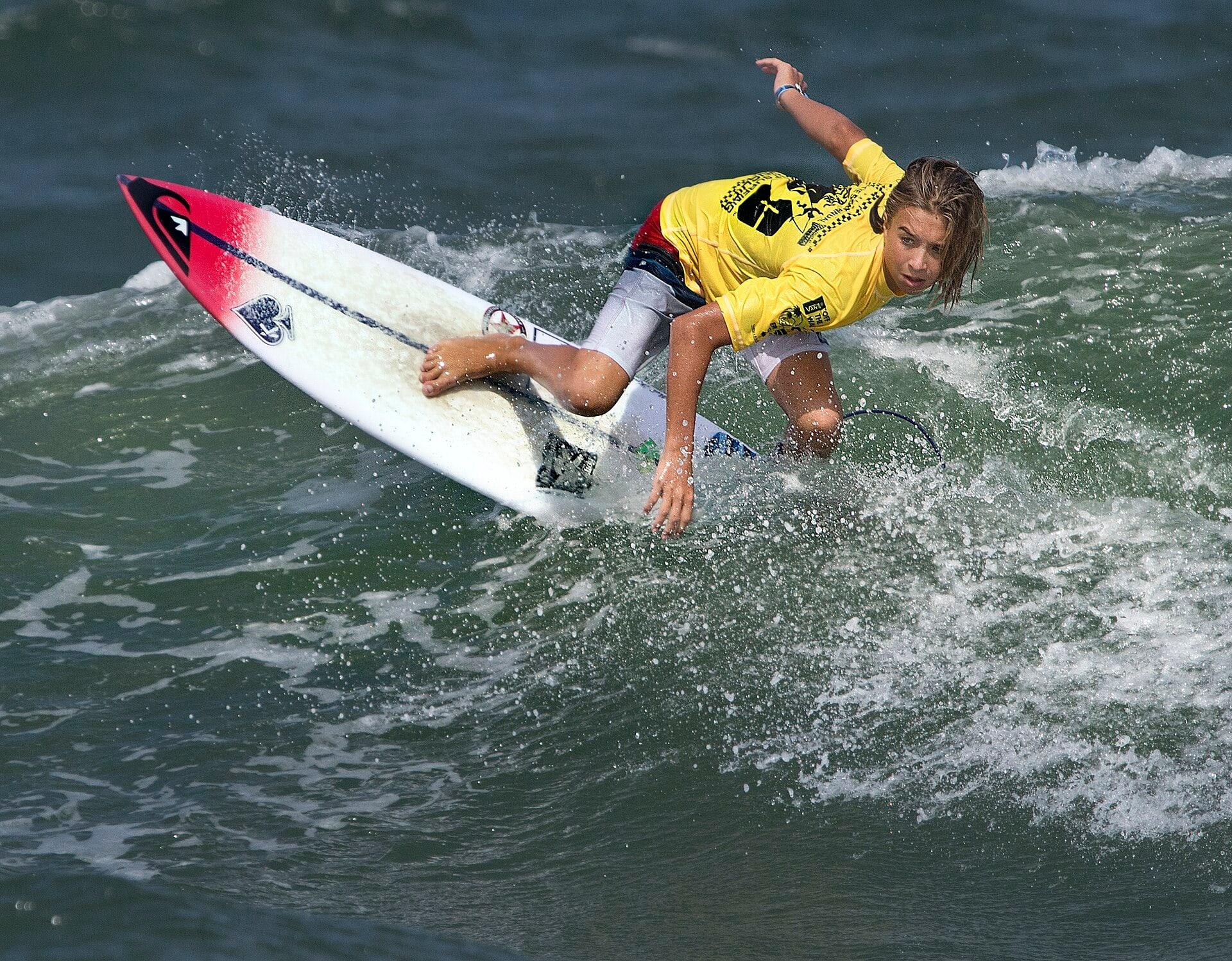 Surfer riding a wave at Virginia Beach