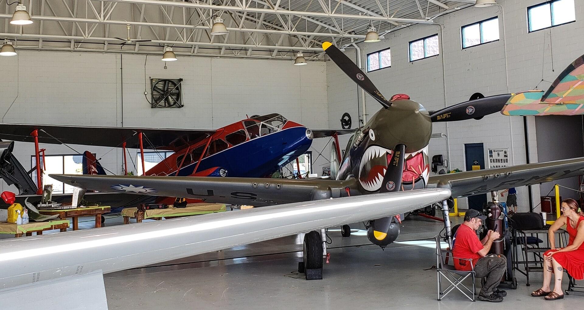 Restored fighter aircraft on display at the Military Aviation Museum